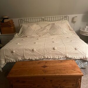 Beautiful vintage, handmade cream-colored afghan. King sized in great condition.